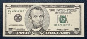 Reposición 5 Dólares